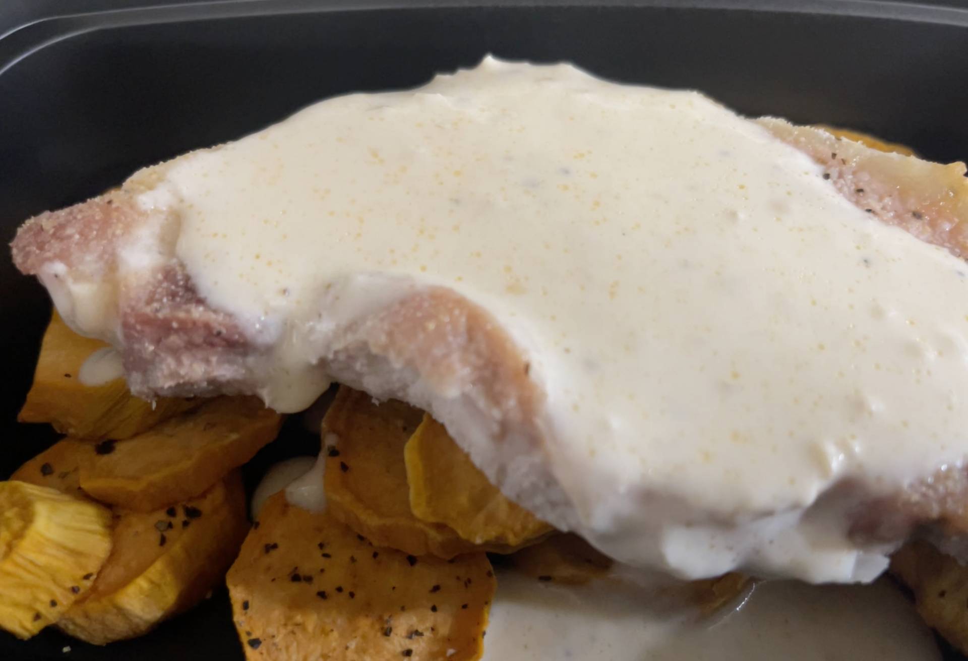 Smothered Pork Chops over Sweet Potatoes